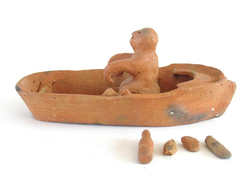 Figura humana en una chalupa (vista lateral)