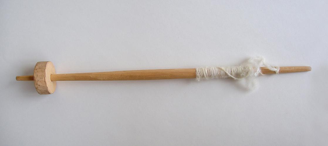 Huso con tortera de madera